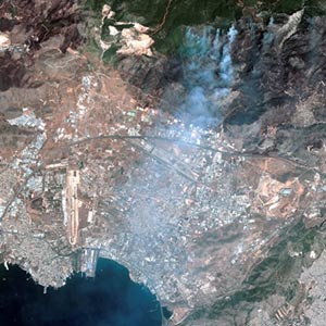 SPOT satellite image, Athens, Greece : the homes and infrastructure destroyed by the fires on the outskirts of the capital.