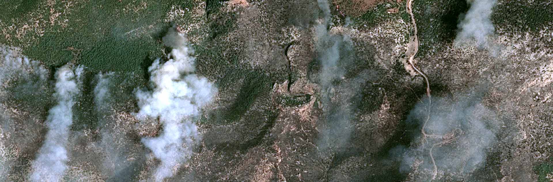 SPOT satellite image, Athens, Greece : the homes and infrastructure destroyed by the fires on the outskirts of the capital.
